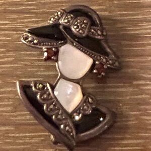 Elegant Black and White Figural Brooch
